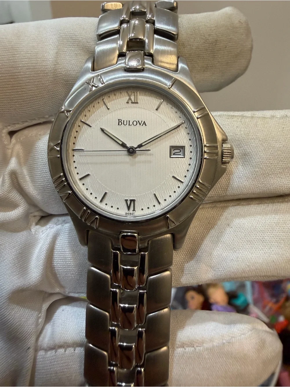Bulova 96B21 Stainless Steel White Pinstripe Dial Roman Bezel Quartz Watch T9
